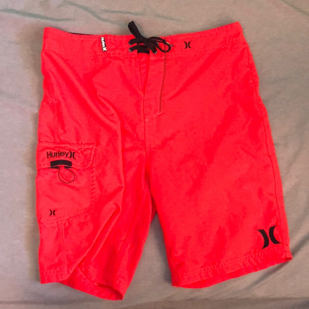 Hurley swim trunks. Size mens medium. Bright orange/salmon colored.